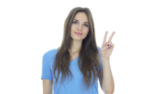 Young  Woman Showing Victory Sign, White Background