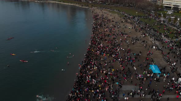 Various drone shots at English Bay near downtown Vancouver, BC during Polar Bear 2019 event