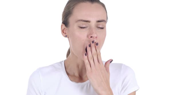 Middle Aged Woman Yawning in Office