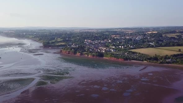 Lympstone establishing aerial shot. beautiful tidal seascape.