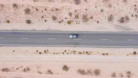 Desert road. Aerial point of view over road in desert. 