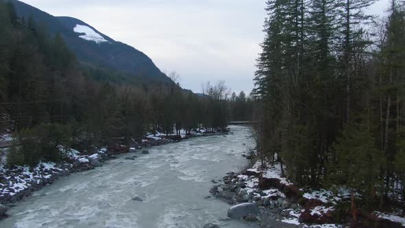 Aerial View of Chilliwack River with Snow During Winter Season