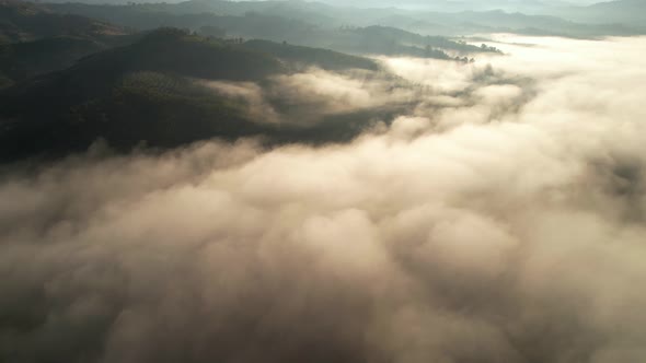 Flying over the clouds during morning sunrise.  wonderful morning sunrise natural Landscape.