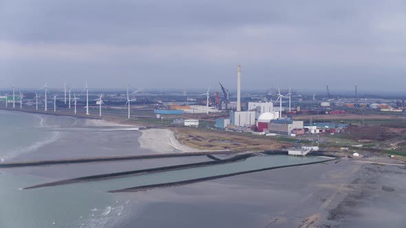 Aerial over ocean view of Borssele Nuclear Power Station, Netherlands