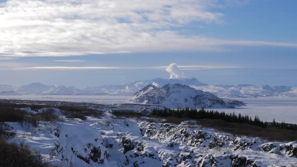 Iceland Panning Across Snow Covered Land With Valley With Mountains