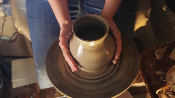 Woman Makes Jug of Clay in Pottery Workshop Smiles Happy Beautiful Footage Background Authentic