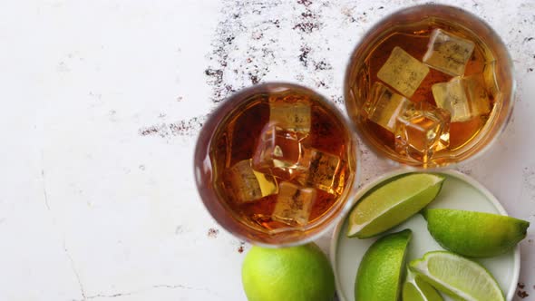 Whiskey Sour Drink with Lemon in Glass on Stone Rustical Background