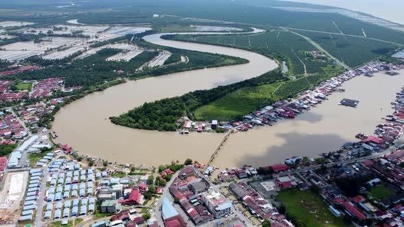 Aerial view Kuala Kurau bridge at curve river