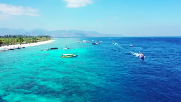 Aerial drone shot nature of perfect bay beach vacation by blue sea and white sand background of a da