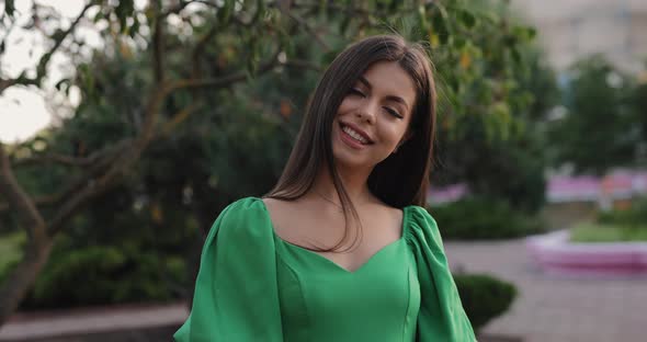 Beautiful Smiling Pretty Woman in Green Dress