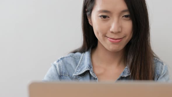Woman concentrate on using laptop computer 