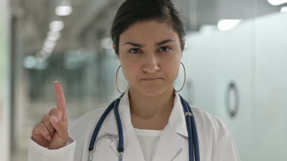Indian Female Doctor Saying No By Finger 