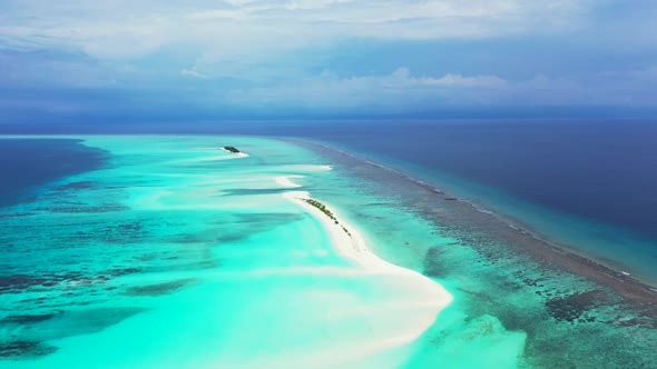 Aerial top view tourism of beautiful resort beach adventure by blue water and white sand background 