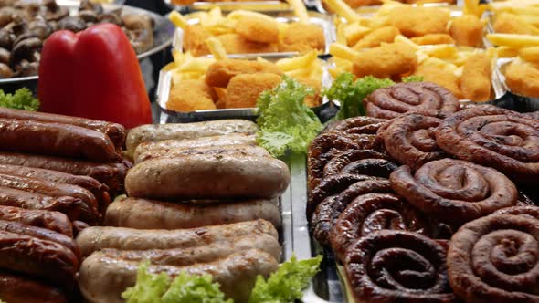 Traditional Street Food. Grilled Food Lie on the Counter of a Street Market. Various Sausages