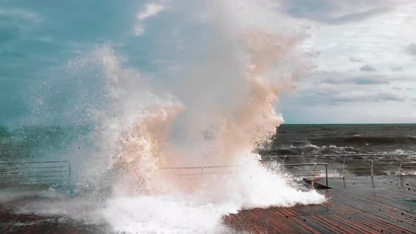 Stormy Weather and Strong Waves on the Ocean in the Sunset. The Concept of Psychological Ill, Stress