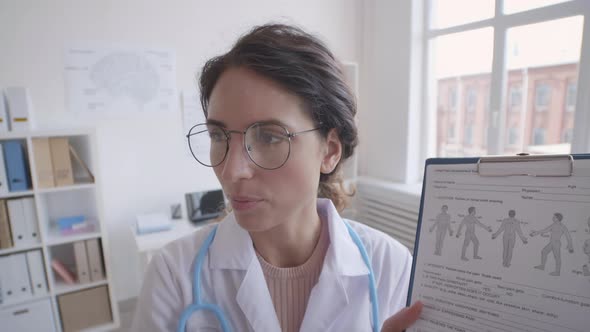 Female Doctor Giving a Lecture