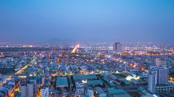 Beautiful Timelapse View of City Lights and Buildings From Night Time to Daytime