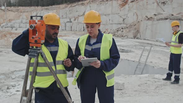 Granite Quarry Workers Posing in Workplace