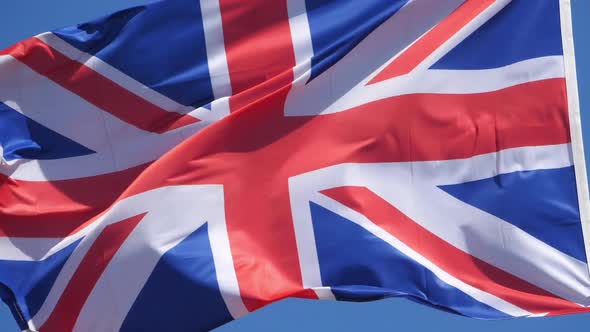 The national British flag waving in the wind.