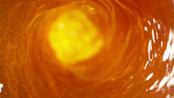 Super Slow Motion Shot of Ice Tea Vortex at 1000 Fps.