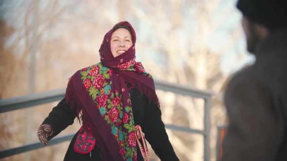 Russian Folklore - Cheerful Woman in a Beautiful Scarf Is Dancing in the Park