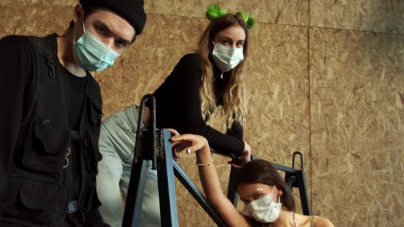 Young People Wearing Blue Face Masks During the COVID19 Pandemic