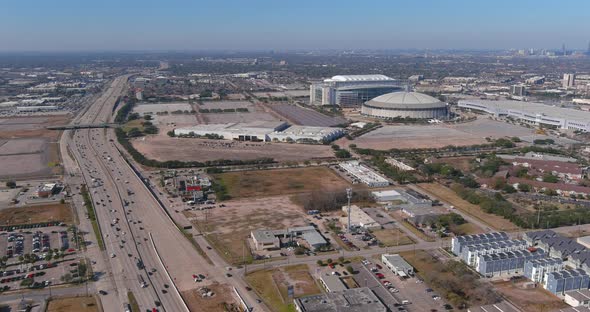 Aerial of the Astrodome and Reliant stadium in Houston, Texas