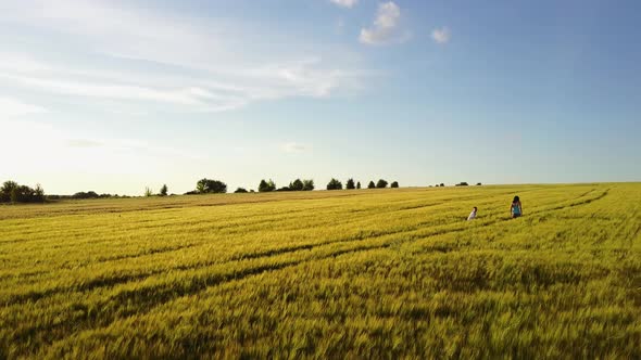 Mother and Son At Wheat Field