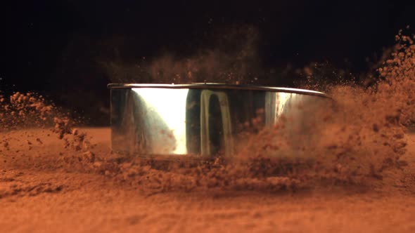 The Super Slow Motion of the Sieve Falls Into the Cocoa Powder