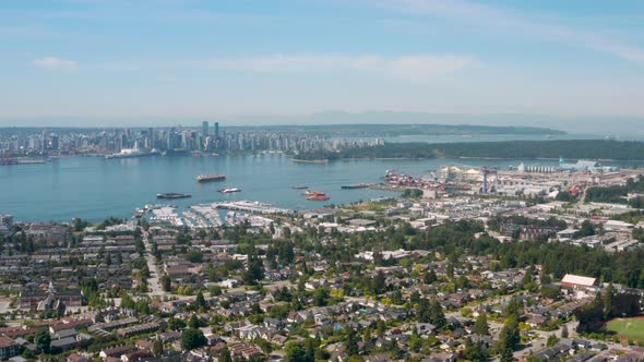 Wide aerial view of Vancouver Harbour and the downtown skyline from Central Lonsdale.