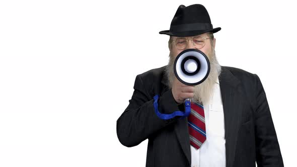 Confident Businessman Making an Announcement Into Megaphone