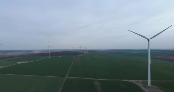 Overcast Day at Wind Turbine Field, Producing Green Energy