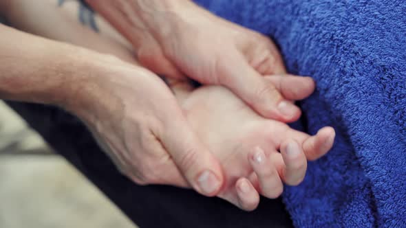 Therapeutic procedure on the female's hand by a professional masseur.