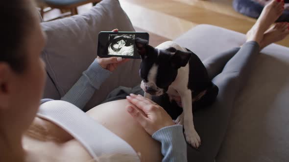 Pregnant woman looking on medical scans. Shot with RED helium camera in 8K