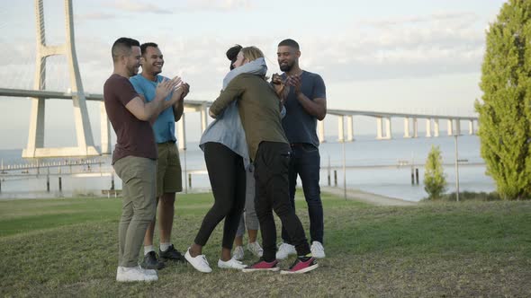 Beautiful African American Woman Hugging Her Friends