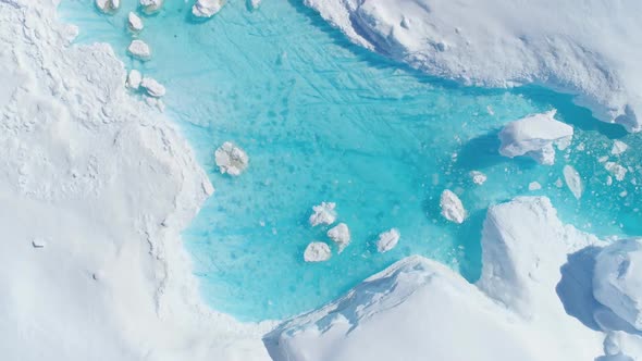 Antarcica Iceberg Turquoise River Top Down View