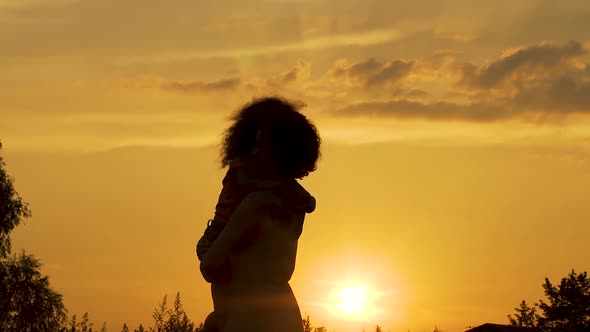 Loving Mother Hugging Her Long-Awaited Child, Joy of Motherhood, Happiness