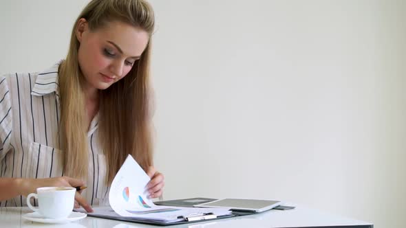 Blonde Business Woman Working at Modern Office