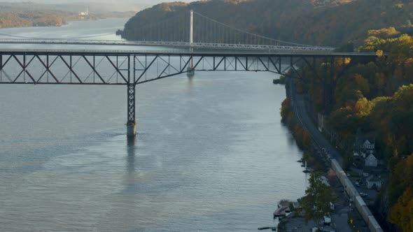 Aerial of walkway and Mid-Hudson Bridge over Hudson river