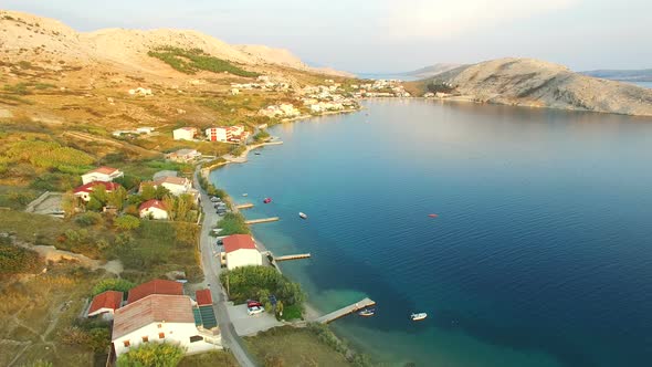 Flying above vacation houses on the island of Pag