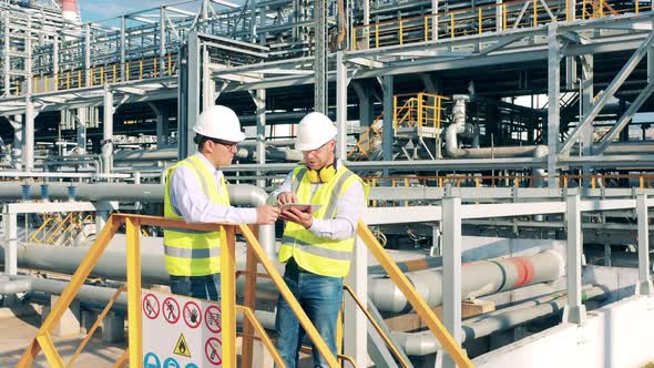 Modern Industrial Workers at the Factory Facility