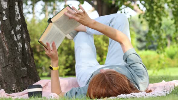 Woman Reading In A Park 4