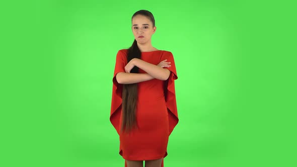 Pretty Young Woman Is Saying Wow, Waves Her Head Approvingly. Green Screen