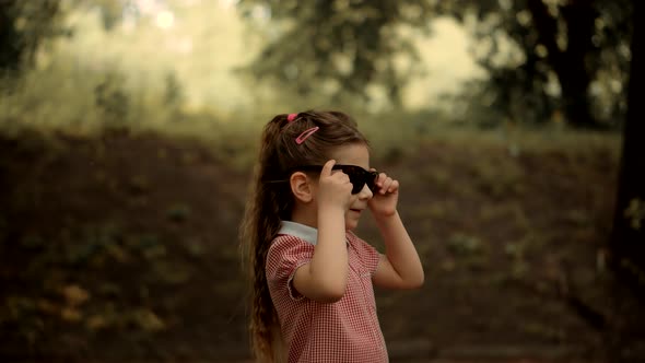 Litter Girl Wearing Father Sunglasses. Playful Cute Preschool Kid Leisure Outdoor.