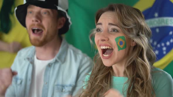 Brazilian Supporters Watching Football Match on Tv, Celebrating Team Victory