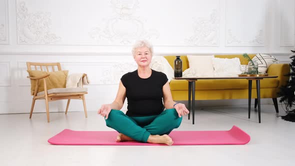 Closeup of an Elderly Woman Doing Yoga