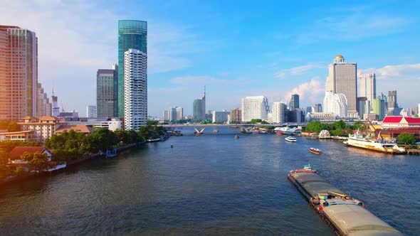 4K UHD : Bangkok River drone view. Flying over the Chao Phraya River