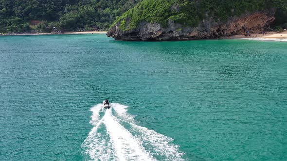 AH - Jetski in Tropical Ocean and Beautiful Island 07