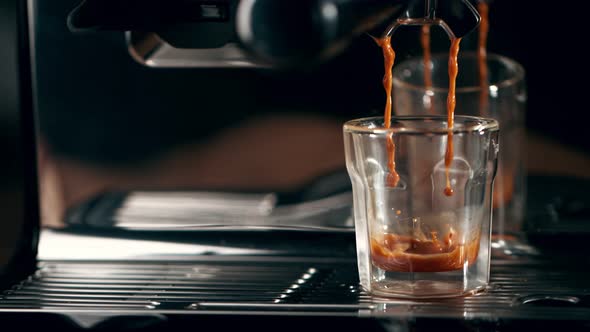 Super Slow Motion Shot of Coffee Machine Pouring Espresso at 1000Fps