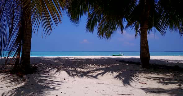 Beautiful birds eye travel shot of a summer white paradise sand beach and blue water background in v